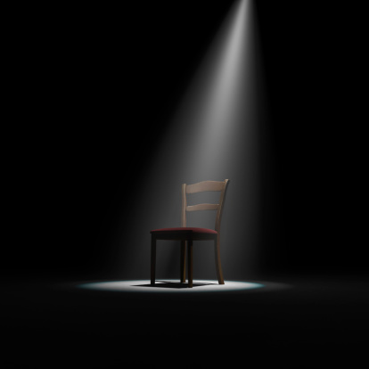 empty chair on stage.